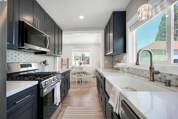 Dining room, Interior, Kitchen, Pendant Lights, Recessed Lighting, Stainless Steel Appliances, Wood Texture Flooring