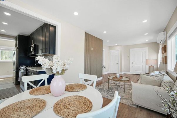 Dining room, Interior, Kitchen, Living room, Recessed Lighting, Stainless Steel Appliances, Wood Texture Flooring