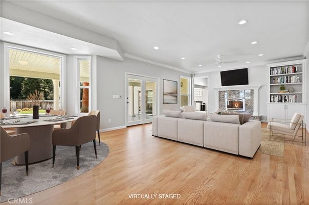 Dining room, Fireplace, Interior, Living room, Recessed Lighting, Wood Texture Flooring