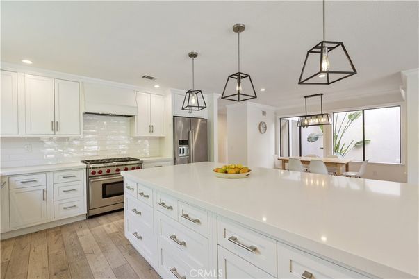 Interior, Kitchen, Pendant Lights, Recessed Lighting, Stainless Steel Appliances, Wood Texture Flooring