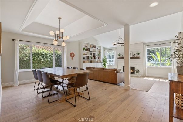 Dining room, Fireplace, Interior, Living room, Pendant Lights, Recessed Lighting, Wood Texture Flooring
