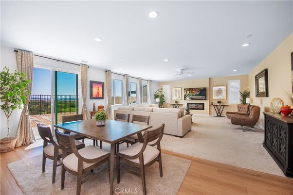 Dining room, Fireplace, Interior, Living room, Recessed Lighting, Wood Texture Flooring