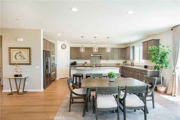 Dining room, Interior, Kitchen, Pendant Lights, Recessed Lighting, Stainless Steel Appliances, Wood Texture Flooring