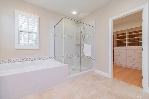 Bathroom, Glass Shower, Interior, Recessed Lighting, Walk-in Closets, Wood Texture Flooring