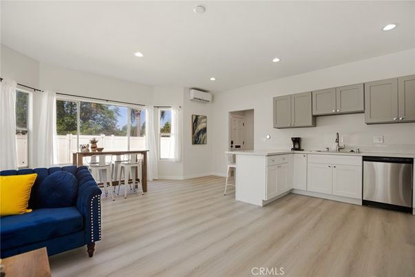 Dining room, Interior, Kitchen, Recessed Lighting, Stainless Steel Appliances, Wood Texture Flooring