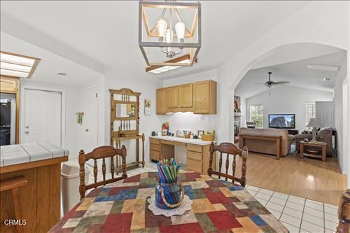 Chandelier, Dining room, Interior, Kitchen, Living room, Tile Countertops, Wood Texture Flooring