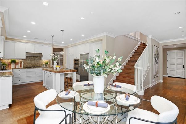 Dining room, Interior, Kitchen, Pendant Lights, Recessed Lighting, Stainless Steel Appliances, Wood Texture Flooring