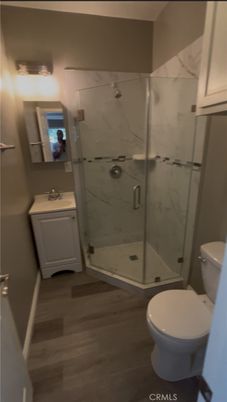 Bathroom, Glass Shower, Interior, Marble Walls, Wood Texture Flooring