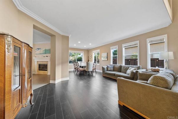 Dining room, Fireplace, Interior, Living room, Recessed Lighting, Wood Texture Flooring