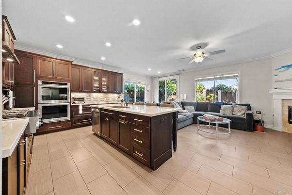 Fireplace, Interior, Kitchen, Living room, Recessed Lighting, Stainless Steel Appliances, Wood Texture Flooring