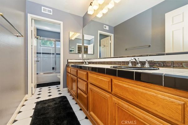 Bathroom, Dual Sink Vanities, Glass Shower, Interior, Tile Countertops