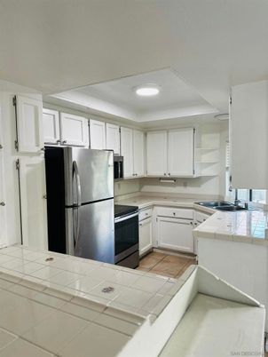 Interior, Kitchen, Recessed Lighting, Tile Countertops