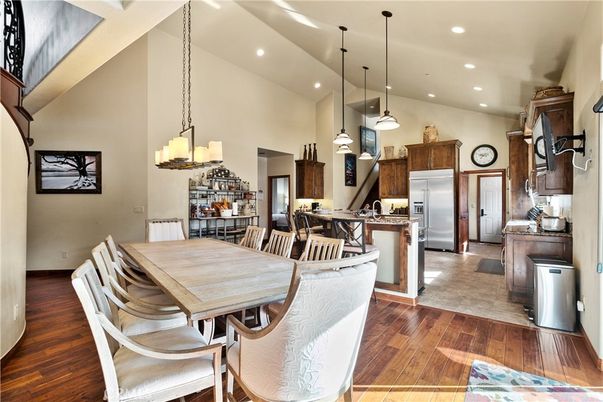 Dining room, Interior, Kitchen, Pendant Lights, Recessed Lighting, Stainless Steel Appliances, Wood Texture Flooring