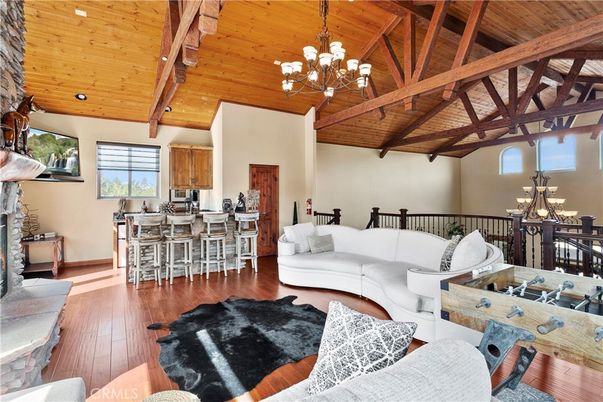Chandelier, Dining room, Interior, Living room, Recessed Lighting, Wooden Beams, Wooden Ceilings, Wood Texture Flooring