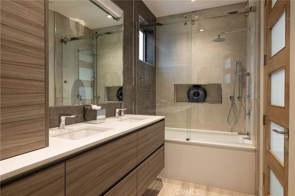 Bathroom, Dual Sink Vanities, Glass Shower, Interior, Recessed Lighting, Wood Texture Flooring
