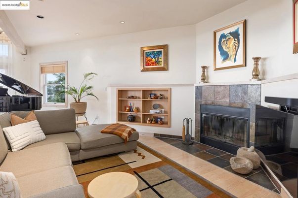 Fireplace, Interior, Living room, Piano, Recessed Lighting, Wood Texture Flooring