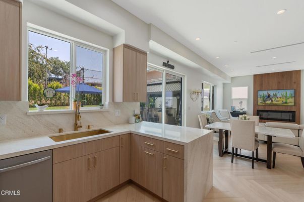 Dining room, Fireplace, Interior, Kitchen, Recessed Lighting, Wood Texture Flooring