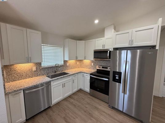 Interior, Kitchen, Recessed Lighting, Stainless Steel Appliances, Wood Texture Flooring