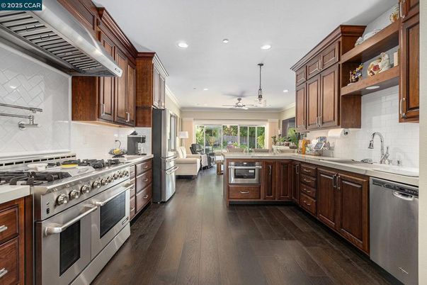 Interior, Kitchen, Pendant Lights, Recessed Lighting, Stainless Steel Appliances, Wood Texture Flooring
