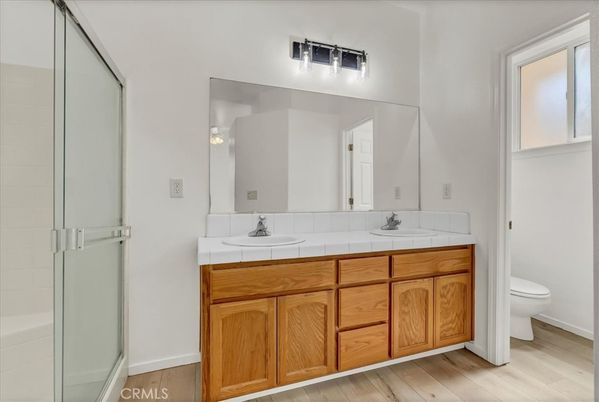 Bathroom, Dual Sink Vanities, Interior, Tile Countertops, Wood Texture Flooring