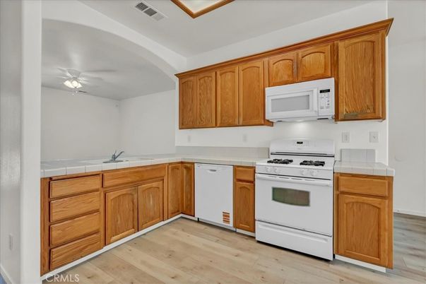 Interior, Kitchen, Tile Countertops, Wood Texture Flooring