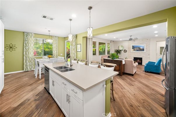 Dining room, Fireplace, Interior, Kitchen, Living room, Pendant Lights, Recessed Lighting, Stone Walls, Wood Texture Flooring