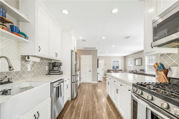 Interior, Kitchen, Recessed Lighting, Stainless Steel Appliances, Wood Texture Flooring