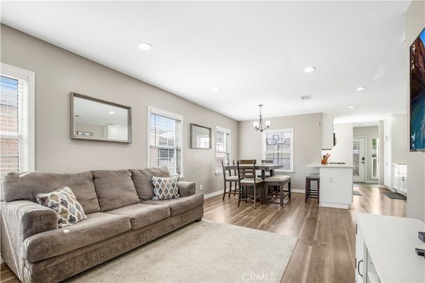 Chandelier, Dining room, Interior, Kitchen, Living room, Recessed Lighting, Wood Texture Flooring
