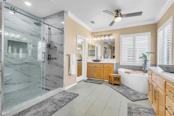 Bathroom, Dual Sink Vanities, Free Standing Baths, Glass Shower, Interior, Marble, Marble Walls, Recessed Lighting