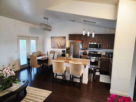 Dining room, Interior, Kitchen, Pendant Lights, Stainless Steel Appliances, Wood Texture Flooring
