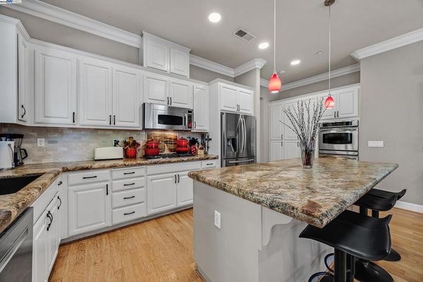 Interior, Kitchen, Pendant Lights, Recessed Lighting, Stainless Steel Appliances, Wood Texture Flooring