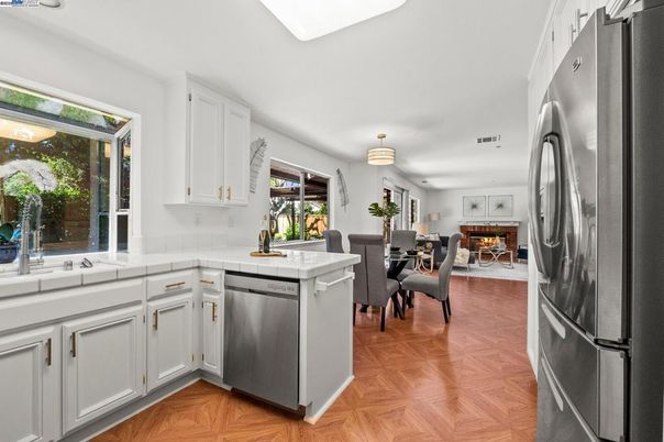 Dining room, Interior, Kitchen, Tile Countertops, Wood Texture Flooring