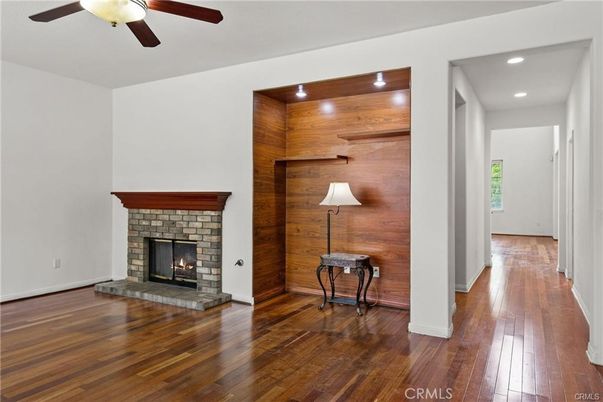 Fireplace, Interior, Recessed Lighting, Wood Texture Flooring, Wooden Walls