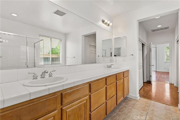 Bathroom, Dual Sink Vanities, Glass Shower, Interior, Recessed Lighting, Tile Countertops