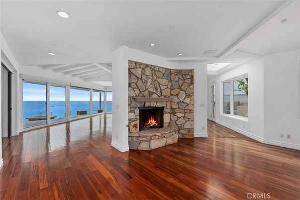 Fireplace, Interior, Recessed Lighting, Water, Wood Texture Flooring