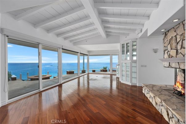 Fireplace, Interior, Recessed Lighting, Stone Walls, Water, Wood Texture Flooring
