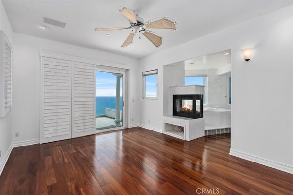 Bathroom, Empty room, Fireplace, Interior, Recessed Lighting, Water, Wood Texture Flooring