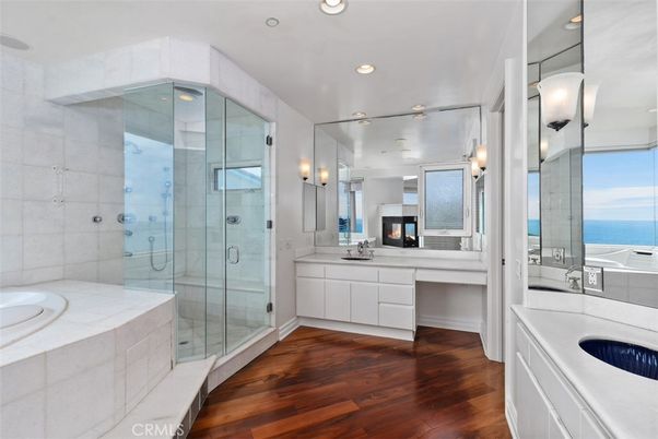 Bathroom, Glass Shower, Interior, Recessed Lighting, Water, Wood Texture Flooring