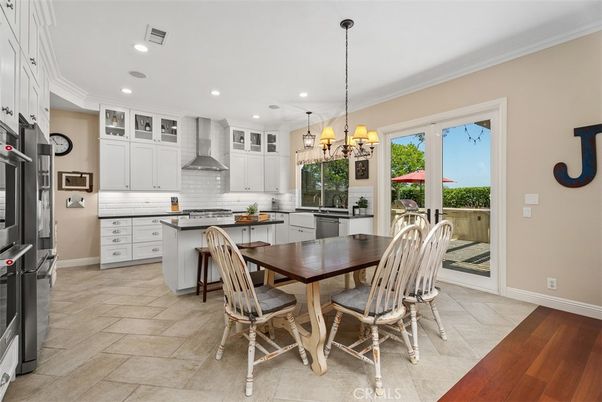 Chandelier, Dining room, Interior, Kitchen, Pendant Lights, Recessed Lighting, Stainless Steel Appliances