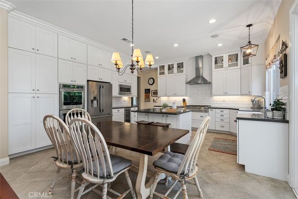 Chandelier, Dining room, Interior, Kitchen, Pendant Lights, Recessed Lighting, Stainless Steel Appliances