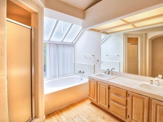 Bathroom, Dual Sink Vanities, Interior, Tile Countertops, Wood Texture Flooring