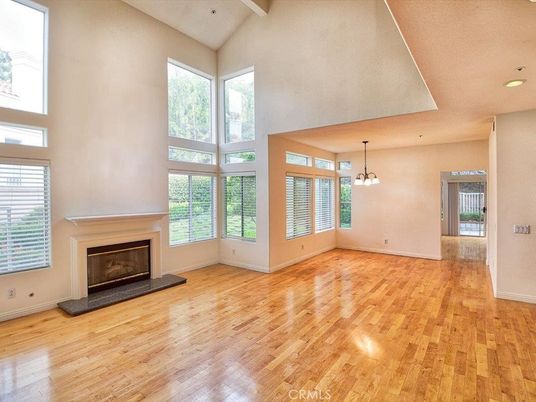 Empty room, Fireplace, Interior, Pendant Lights, Recessed Lighting, Wood Texture Flooring