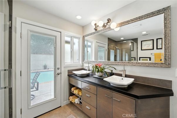 Bathroom, Dual Sink Vanities, Glass Shower, Interior, Recessed Lighting, Wood Texture Flooring