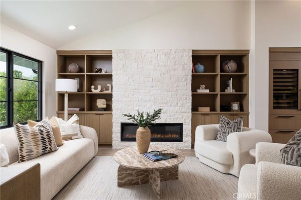 Fireplace, Interior, Living room, Recessed Lighting, Stone Walls, Wood Texture Flooring