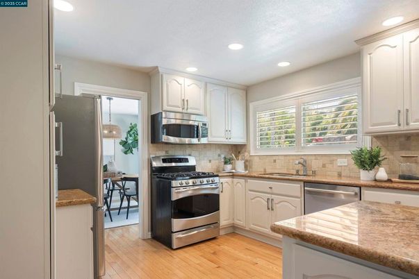 Interior, Kitchen, Recessed Lighting, Stainless Steel Appliances, Wood Texture Flooring