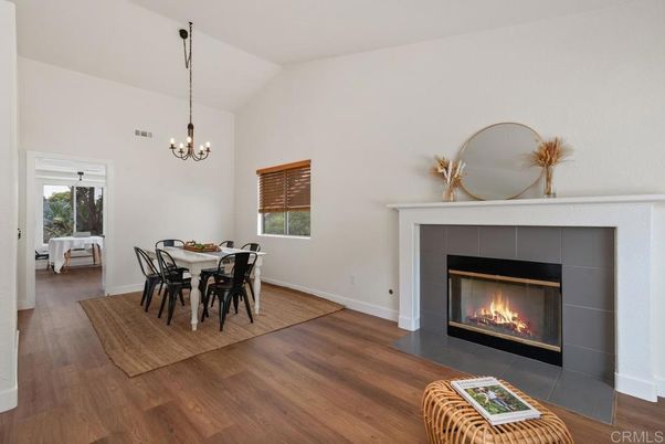 Chandelier, Dining room, Fireplace, Interior, Pendant Lights, Wood Texture Flooring