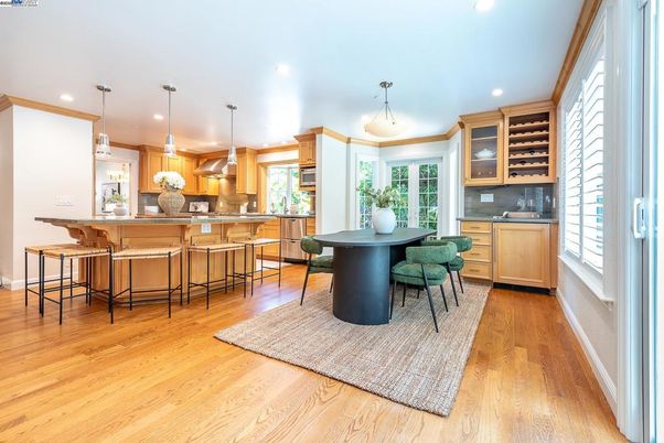 Dining room, Interior, Kitchen, Pendant Lights, Recessed Lighting, Stainless Steel Appliances, Wood Texture Flooring