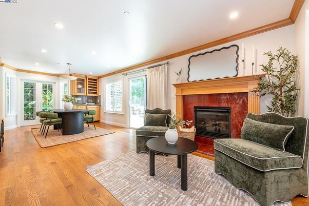 Dining room, Fireplace, Interior, Living room, Pendant Lights, Recessed Lighting, Wood Texture Flooring