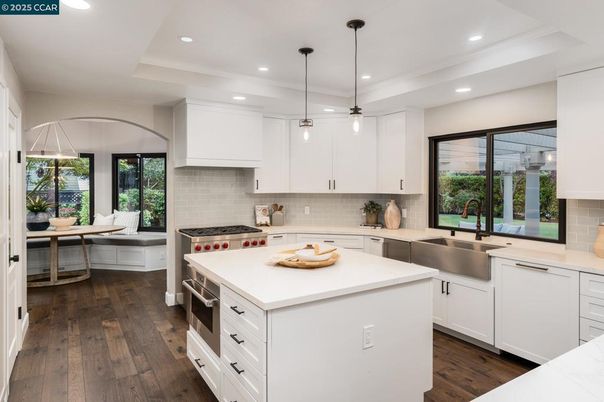 Dining room, Interior, Kitchen, Pendant Lights, Recessed Lighting, Stainless Steel Appliances, Wood Texture Flooring