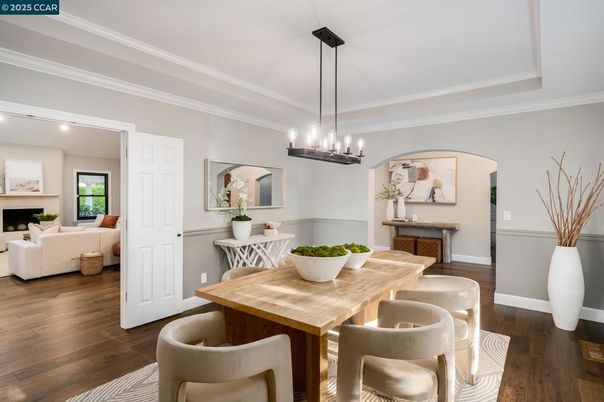 Chandelier, Dining room, Fireplace, Interior, Living room, Pendant Lights, Recessed Lighting, Wood Texture Flooring